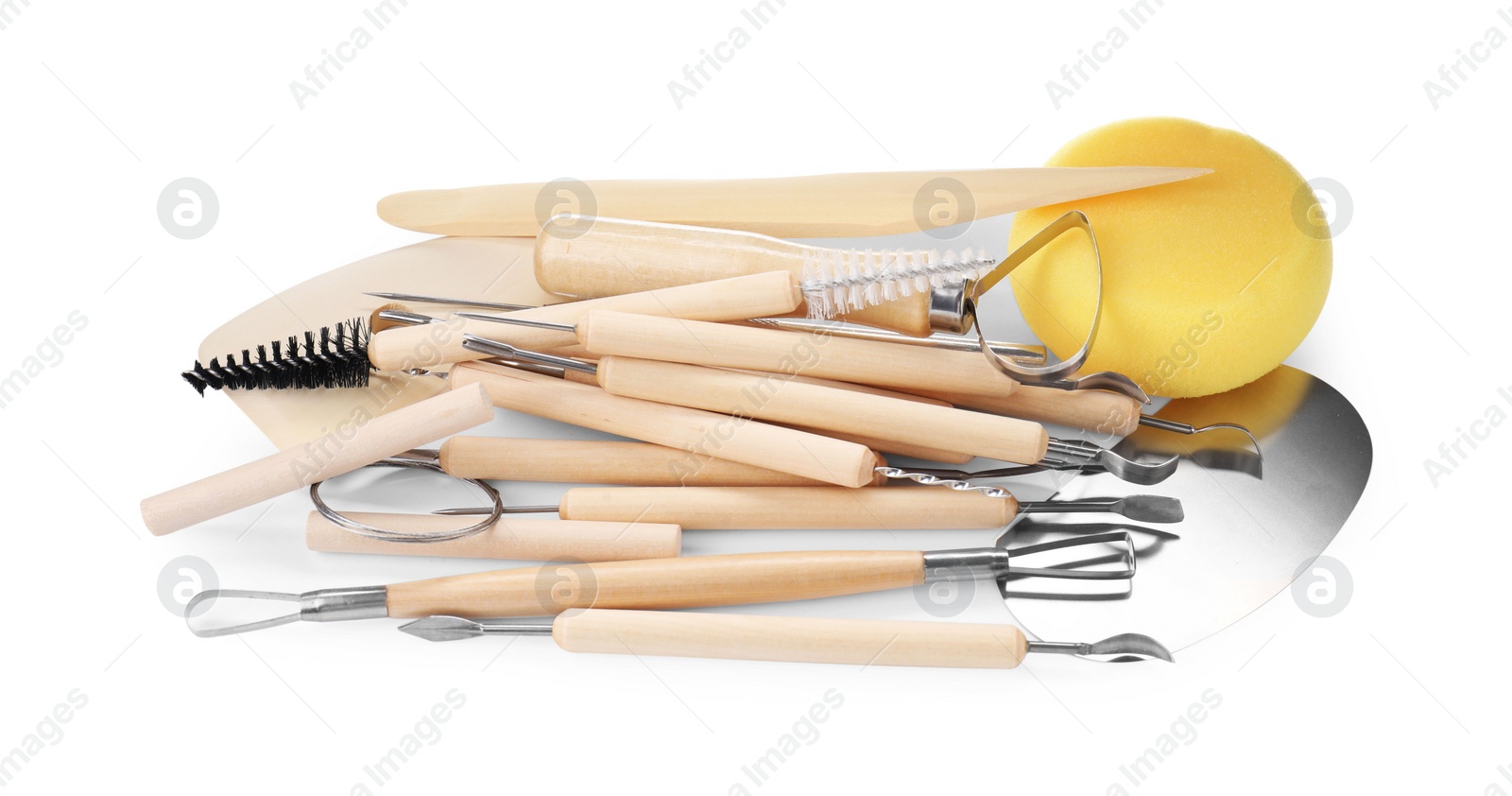 Photo of Set of different clay crafting tools isolated on white