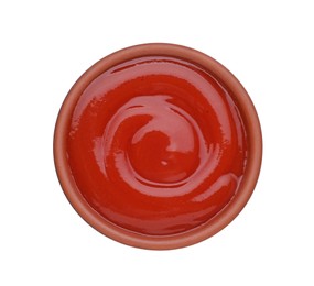 Photo of Bowl of tasty ketchup isolated on white, top view. Tomato sauce