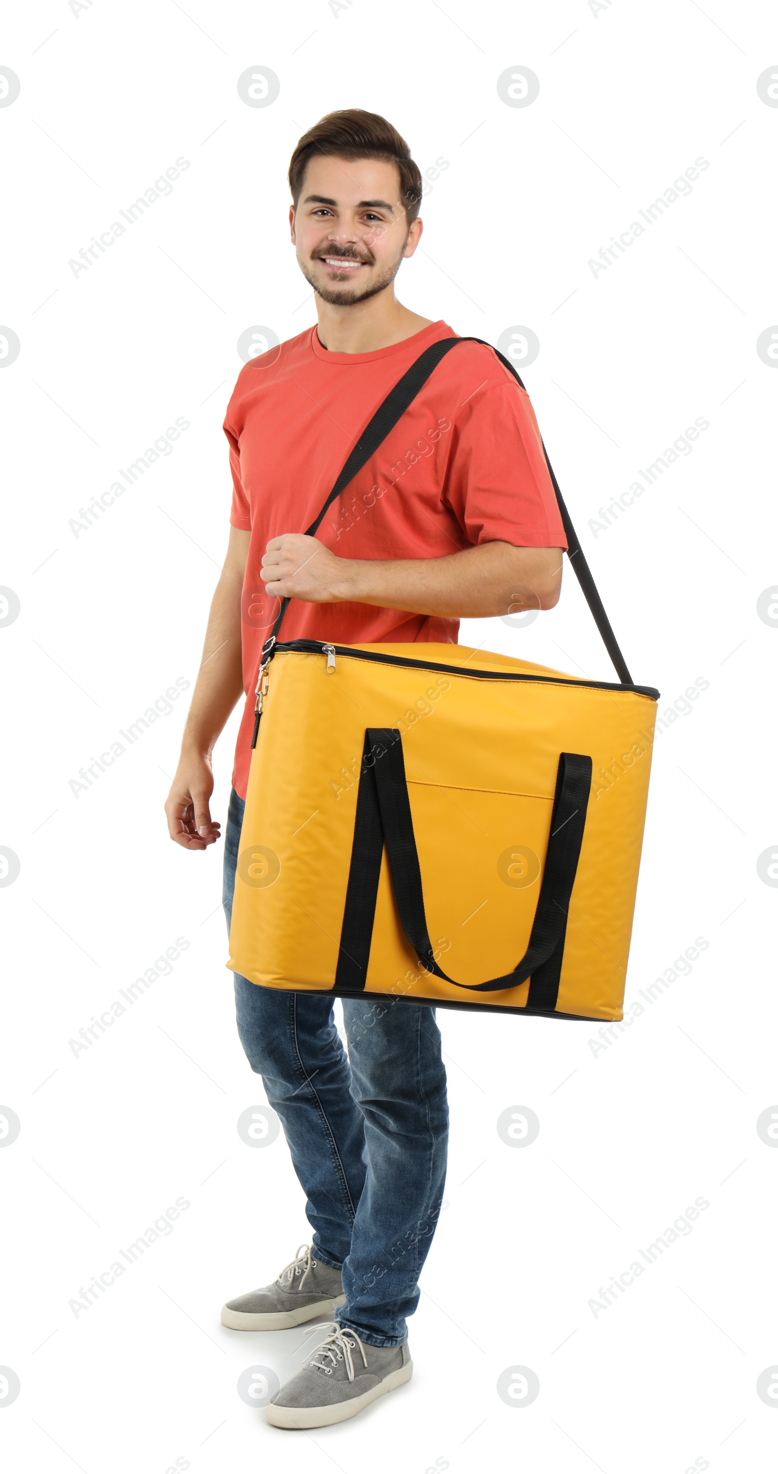 Photo of Young courier with thermo bag on white background. Food delivery service