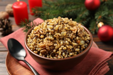 Traditional Christmas slavic dish kutia in bowl on table, closeup