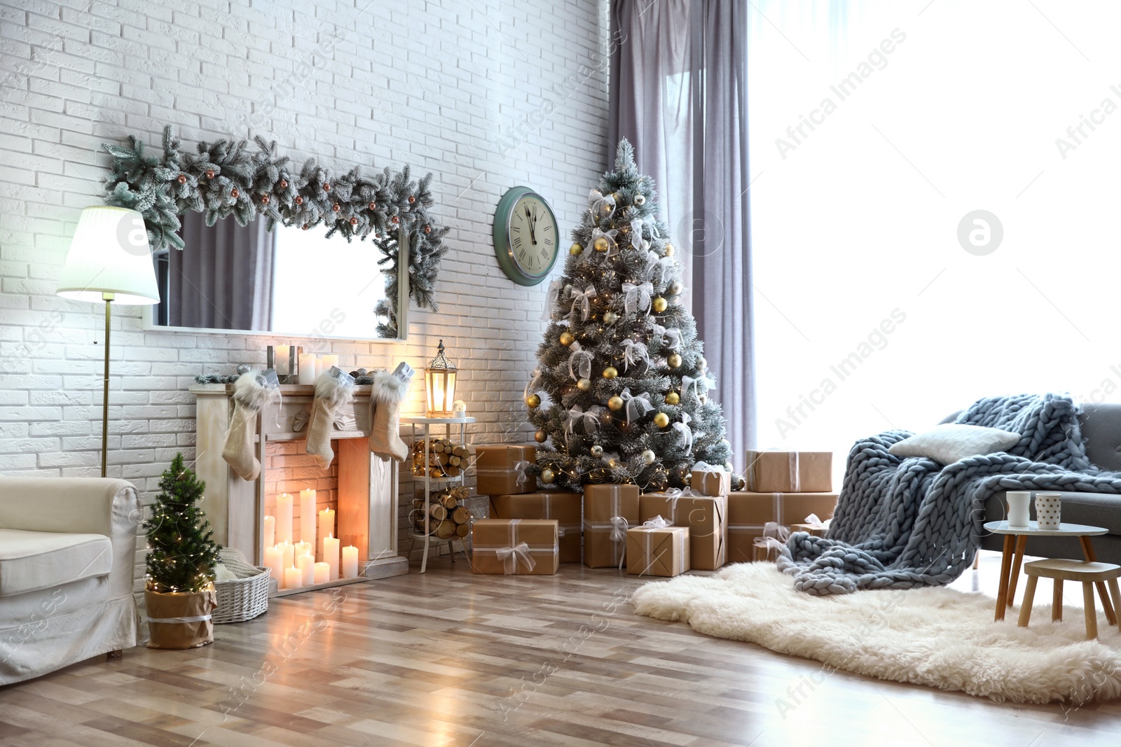 Photo of Stylish interior of living room with decorated Christmas tree