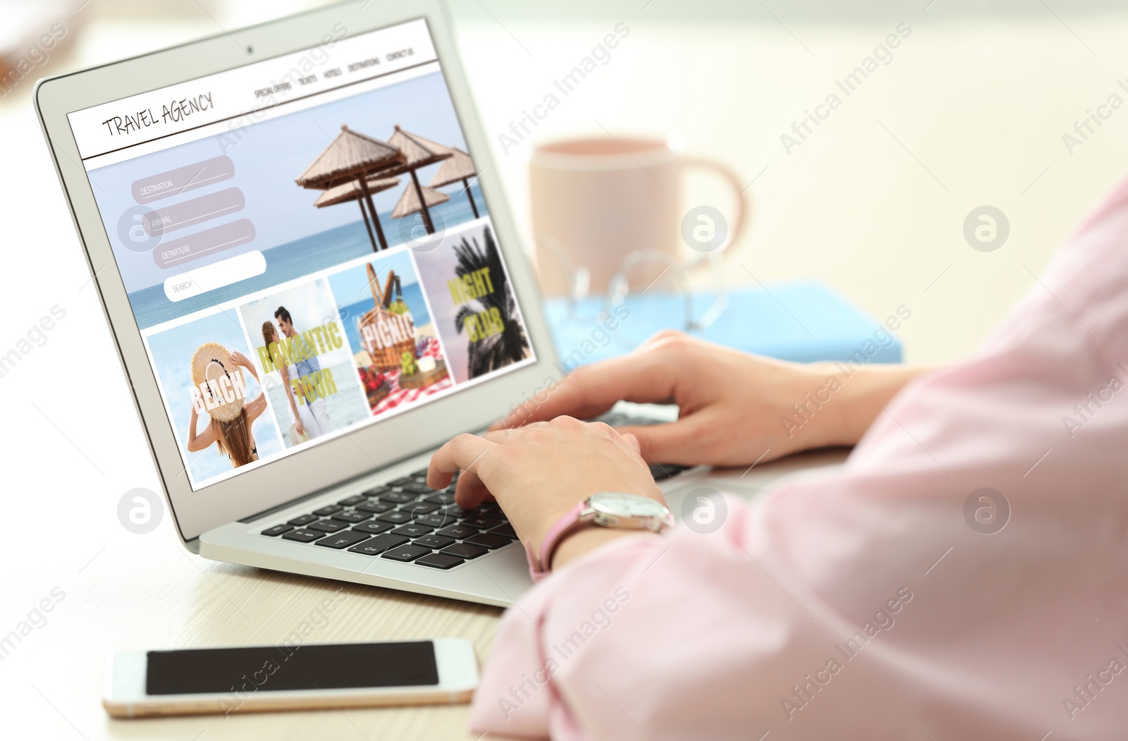 Image of Woman using laptop to plan trip, closeup. Travel agency website