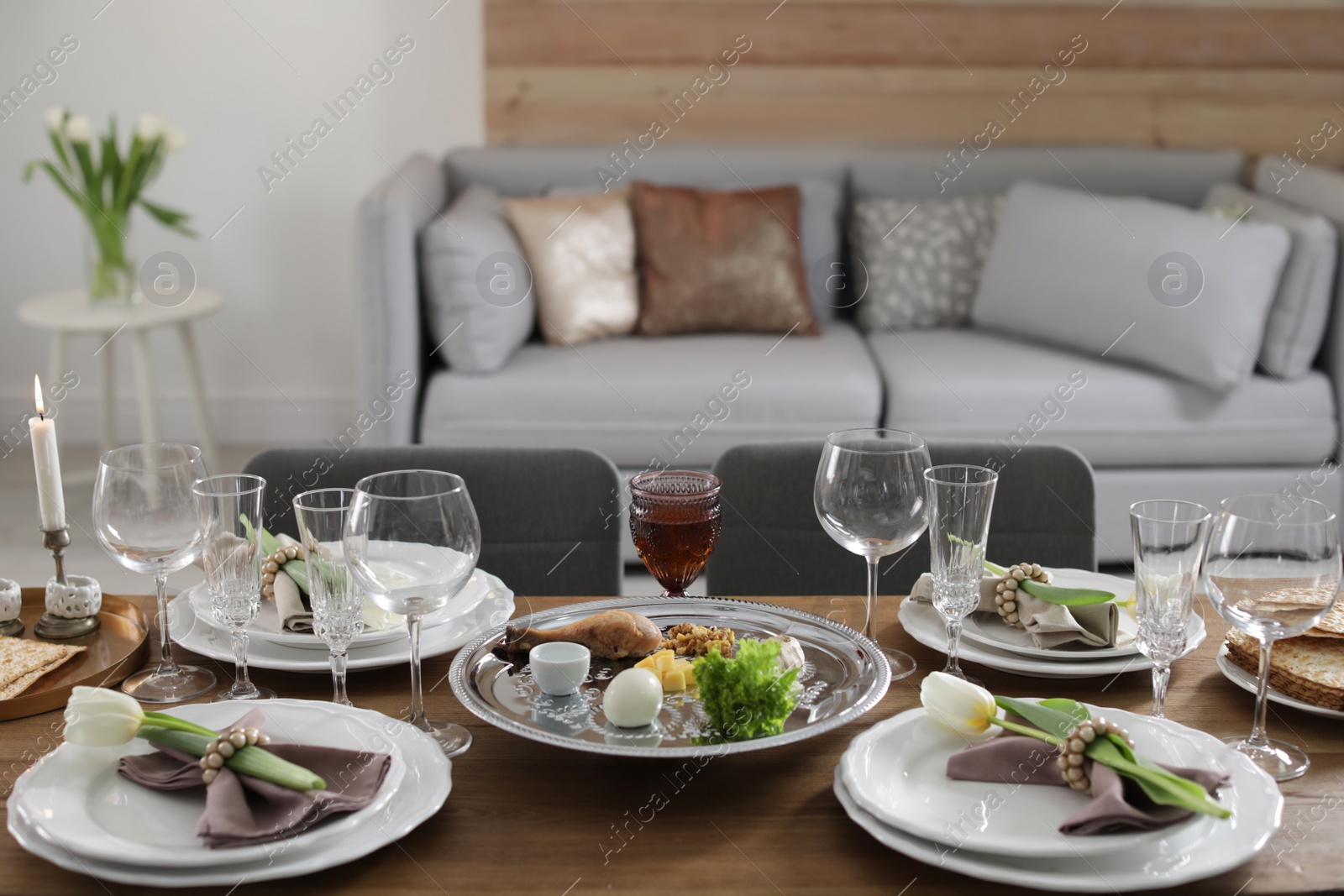 Photo of Festive Passover table setting at home. Pesach celebration