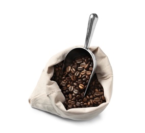 Photo of Bag with scoop and roasted coffee beans on white background, top view