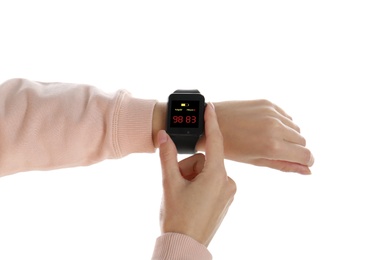 Image of Woman measuring oxygen level with smartwatch on white background, closeup