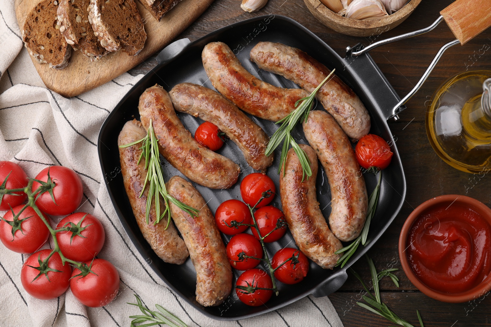 Photo of Flat lay composition with tasty homemade sausages on wooden table