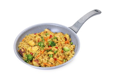 Photo of Tasty rice with meat and vegetables in frying pan isolated on white