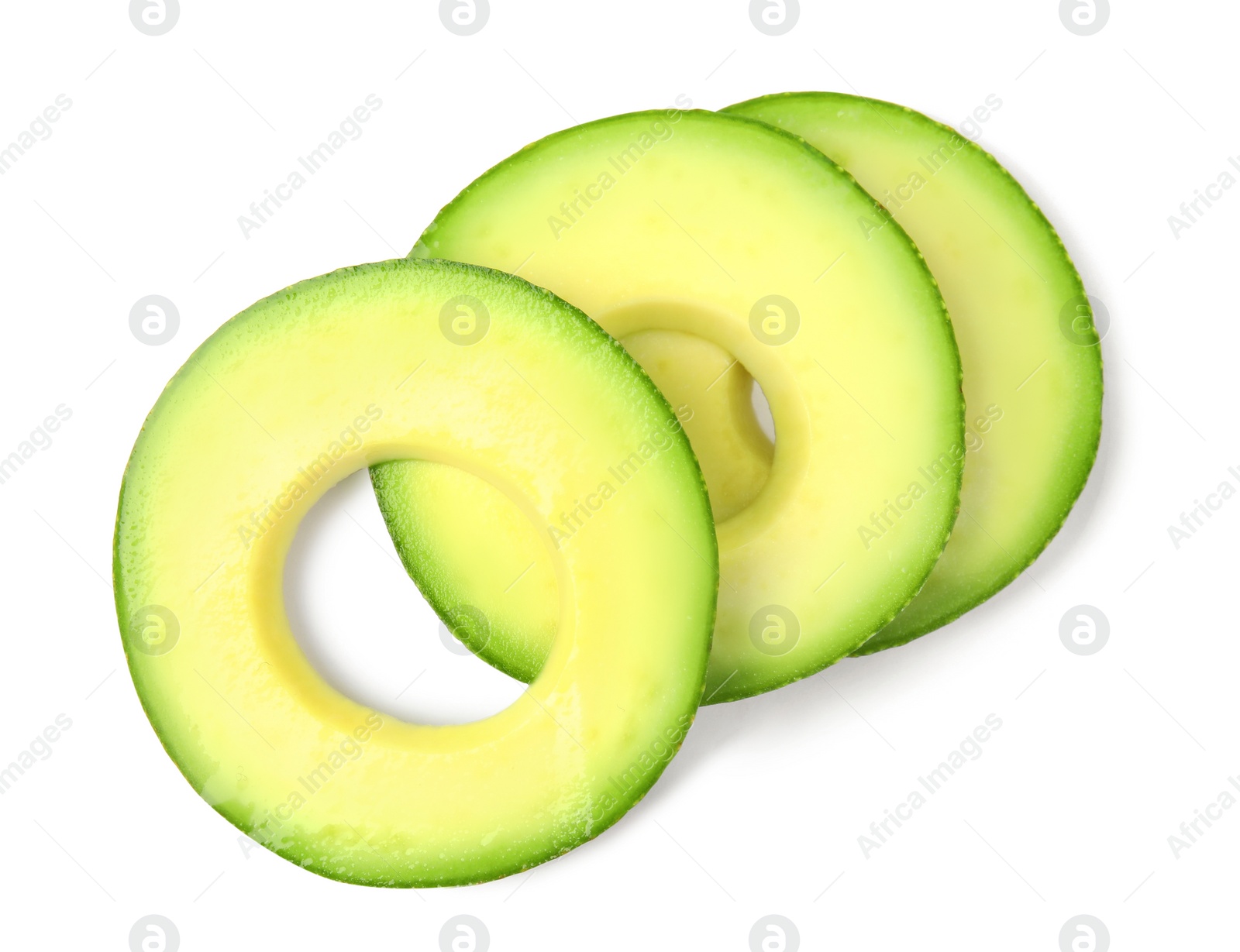 Photo of Slices of tasty ripe avocado on white background, top view