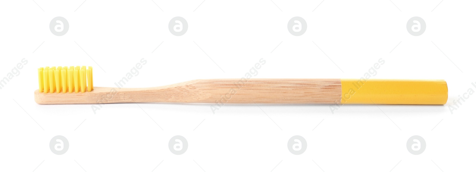 Photo of Bamboo toothbrush on white background. Dental care