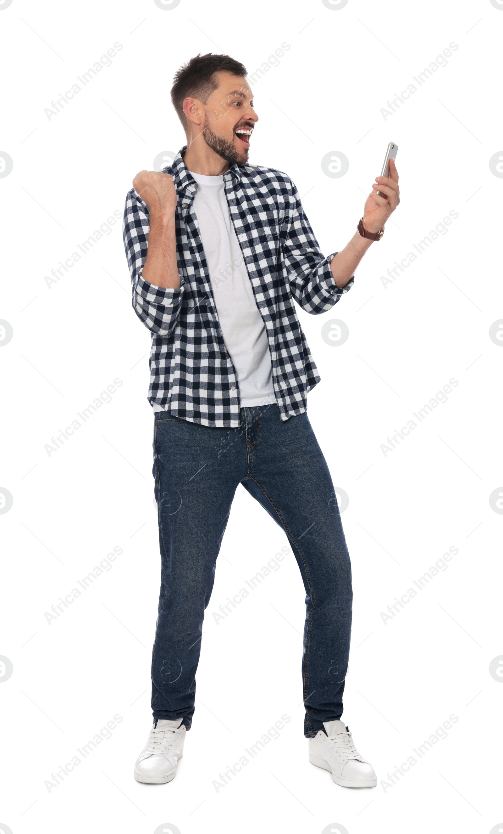 Photo of Emotional man looking at smartphone on white background