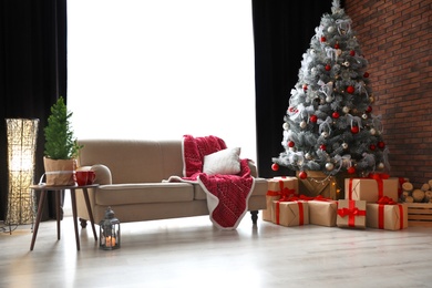 Photo of Stylish room interior with beautiful Christmas tree