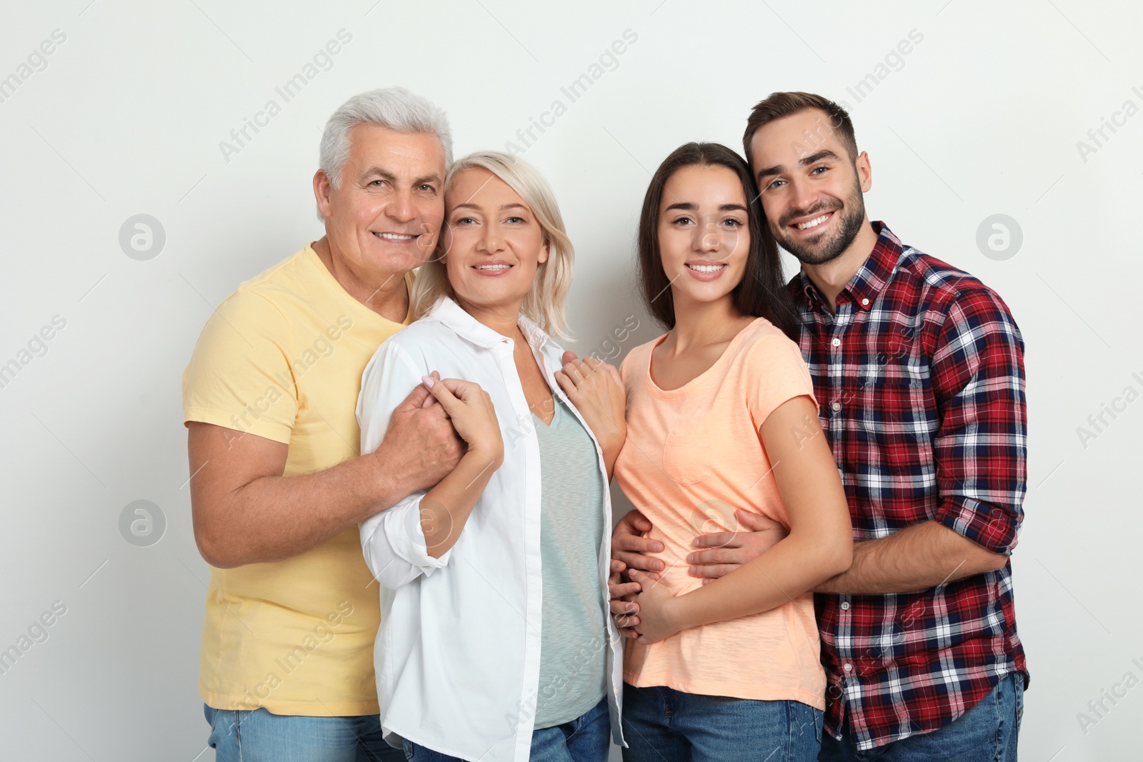 Photo of Portrait of happy family on white background