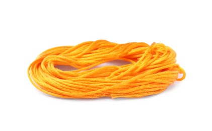 Photo of Light orange embroidery thread on white background