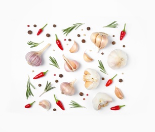 Photo of Composition with garlic, rosemary and peppers on white background, top view