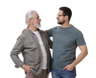 Happy son and his dad on white background