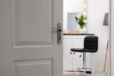 Closeup of open door in modern apartment