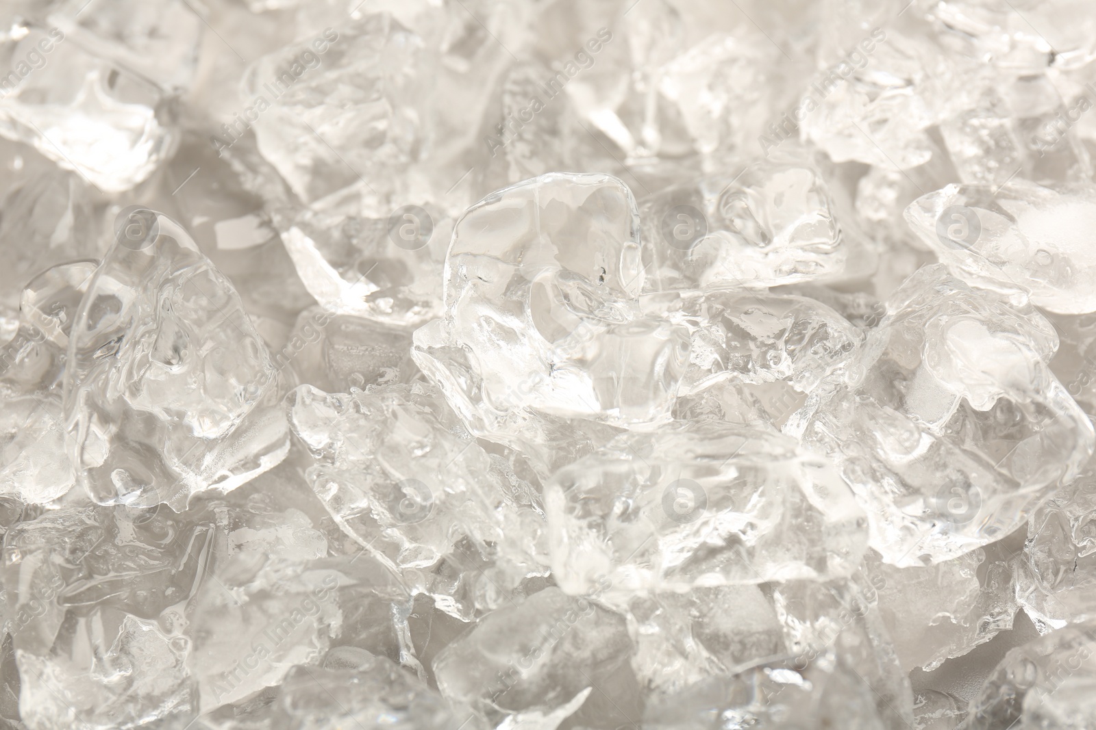 Photo of Pieces of crushed ice as background, closeup