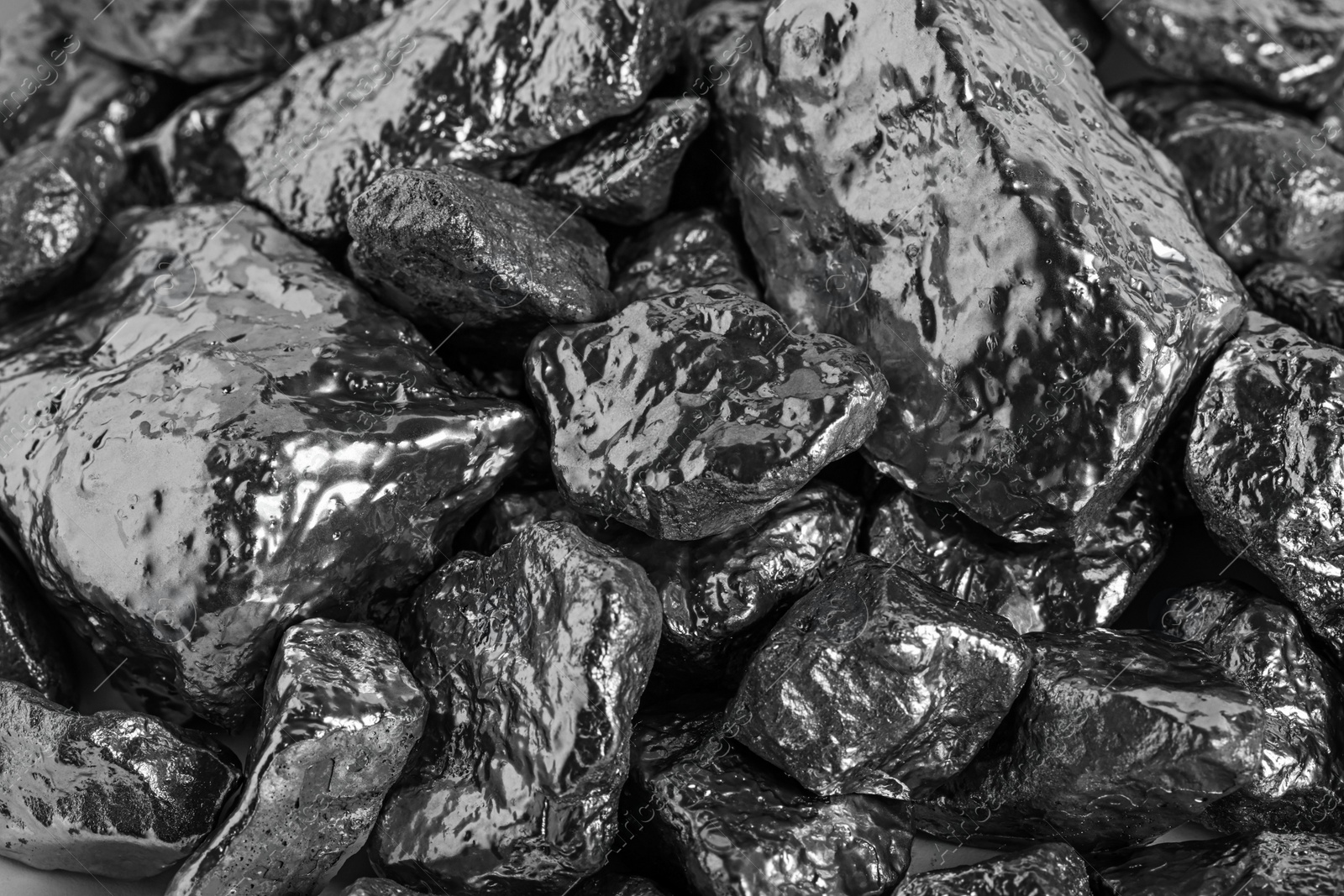 Photo of Pile of silver nuggets as background, top view