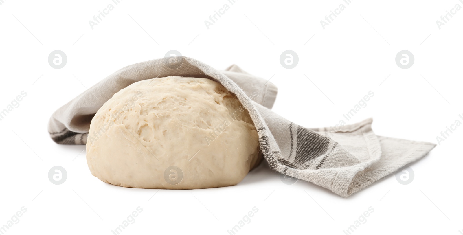 Photo of Dough for pastries covered with napkin on white background