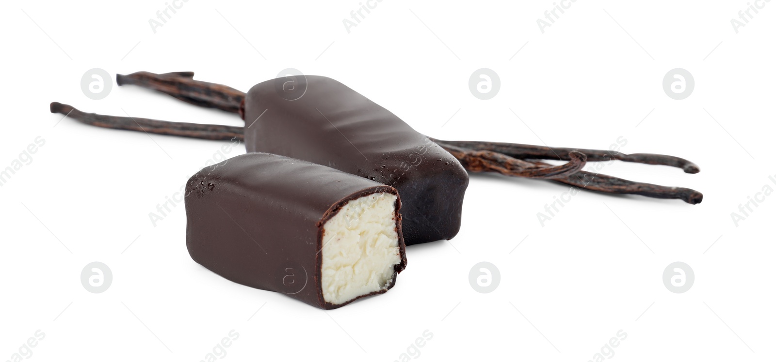 Photo of Glazed curd cheese bars and vanilla pods isolated on white