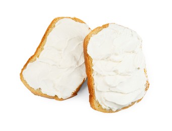 Slices of bread with cream cheese isolated on white, top view