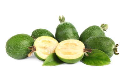 Pile of feijoas and leaves on white background