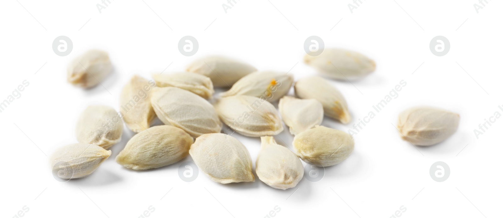 Photo of Many seeds of tangerine isolated on white