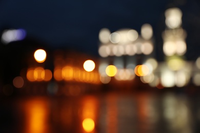 Photo of Blurred view of beautiful city at night. Bokeh effect