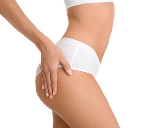 Photo of Closeup view of attractive slim woman in underwear on white background. Cellulite problem concept