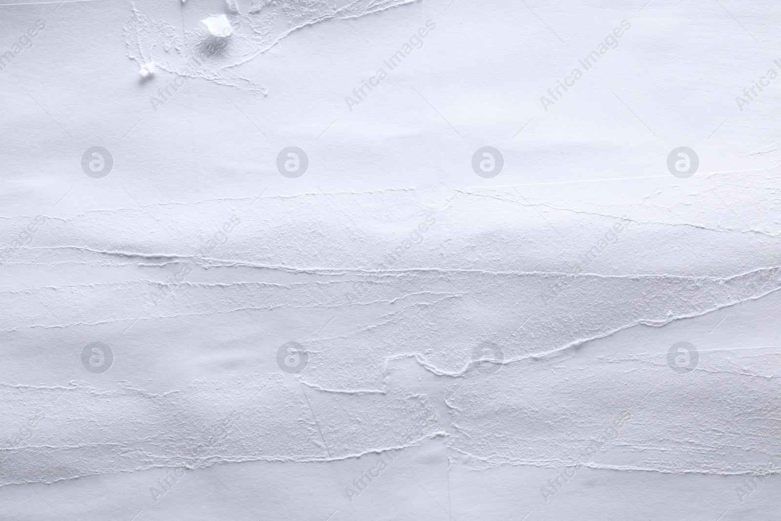 Photo of Texture of white creased paper as background, top view. Wall poster