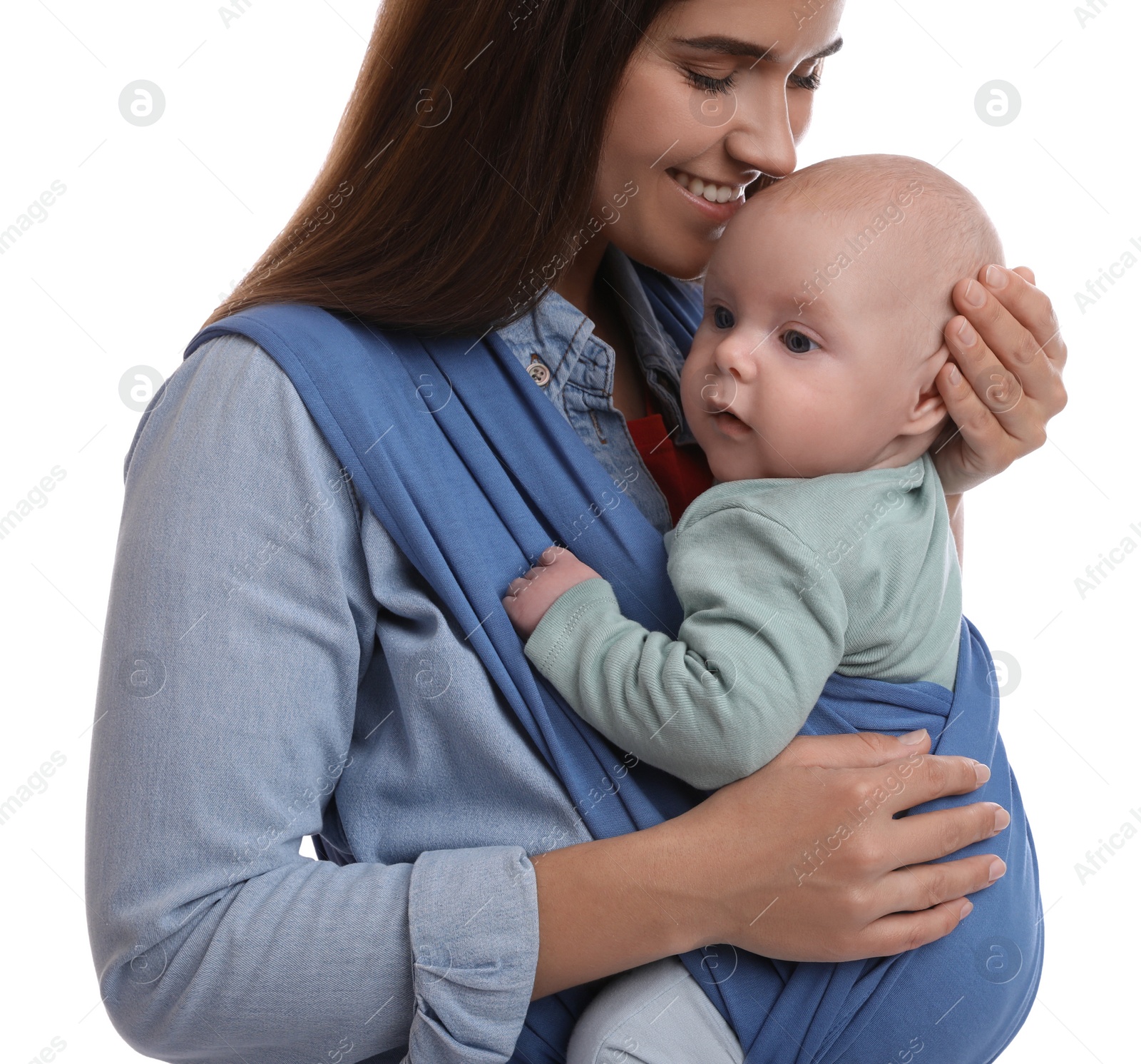 Photo of Mother holding her child in sling (baby carrier) on white background, closeup