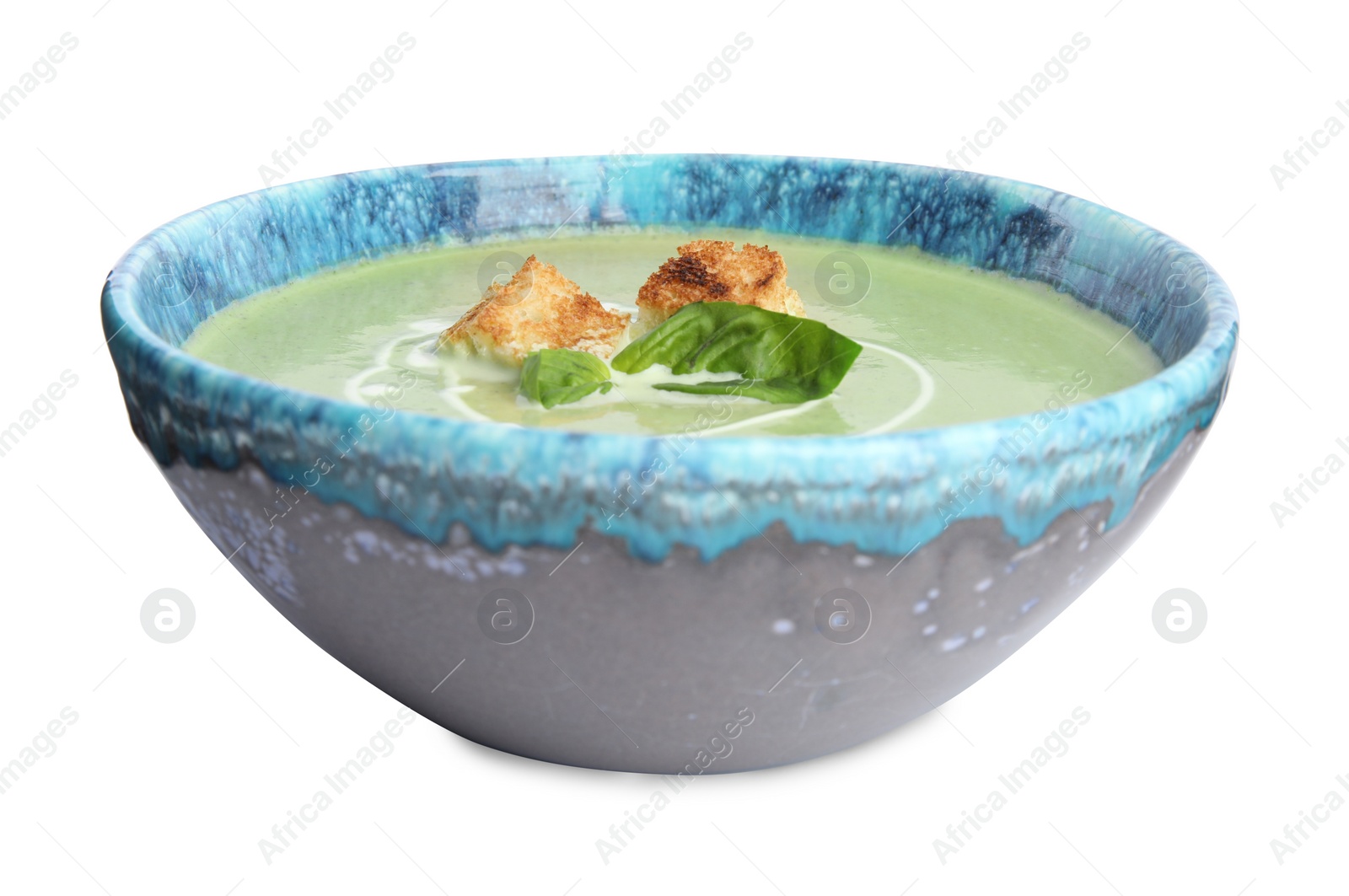 Photo of Delicious broccoli cream soup with croutons isolated on white