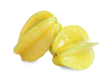 Photo of Delicious ripe carambolas on white background. Exotic fruit
