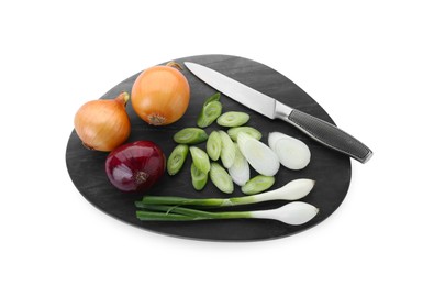 Board with different kinds of onions and knife isolated on white, top view