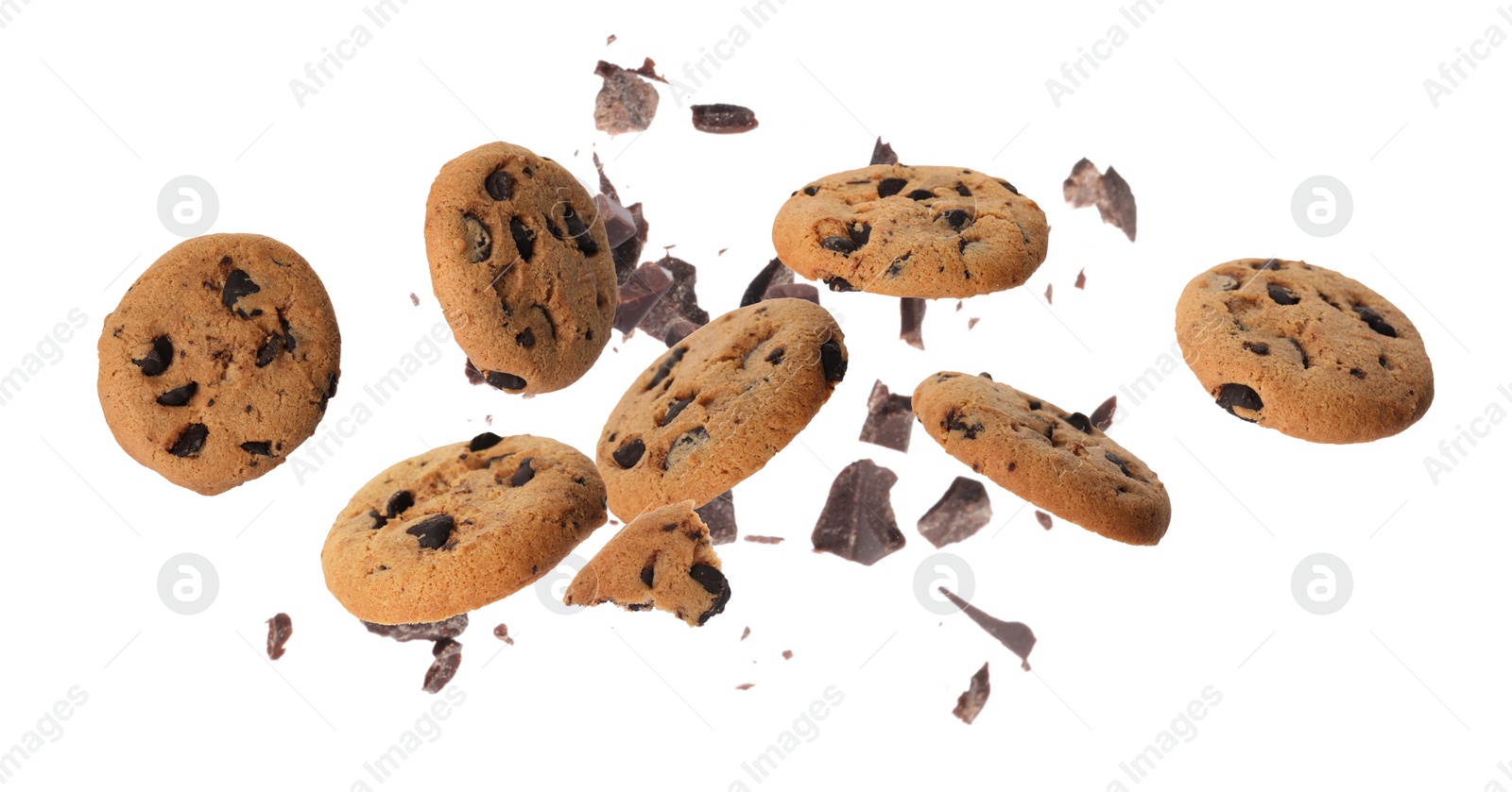 Image of Delicious chocolate chip cookies and pieces of chocolate falling on white background