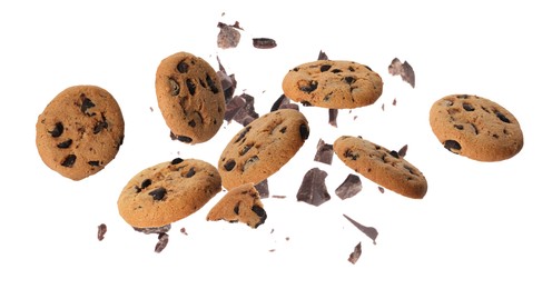 Image of Delicious chocolate chip cookies and pieces of chocolate falling on white background