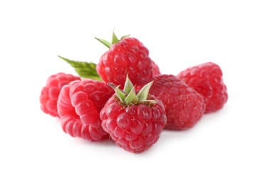 Photo of Pile of fresh ripe raspberries with leaves isolated on white