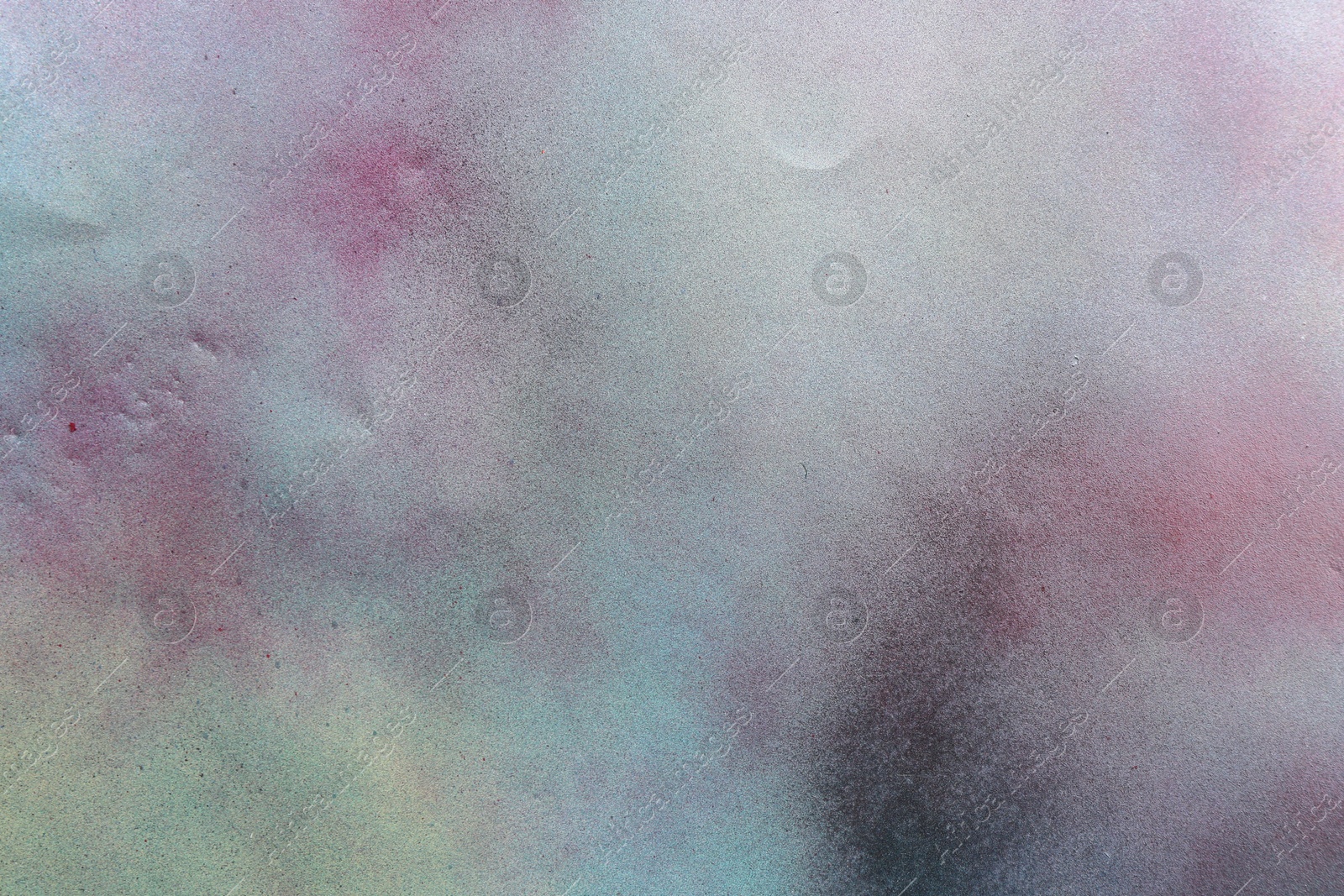 Photo of Texture of abstract spray paint as background, top view