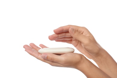 Photo of Woman holding soap bar on white background, closeup