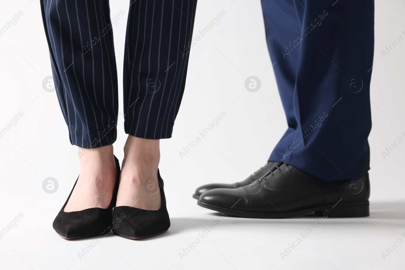 Photo of Businesswoman and businessman on white background, closeup