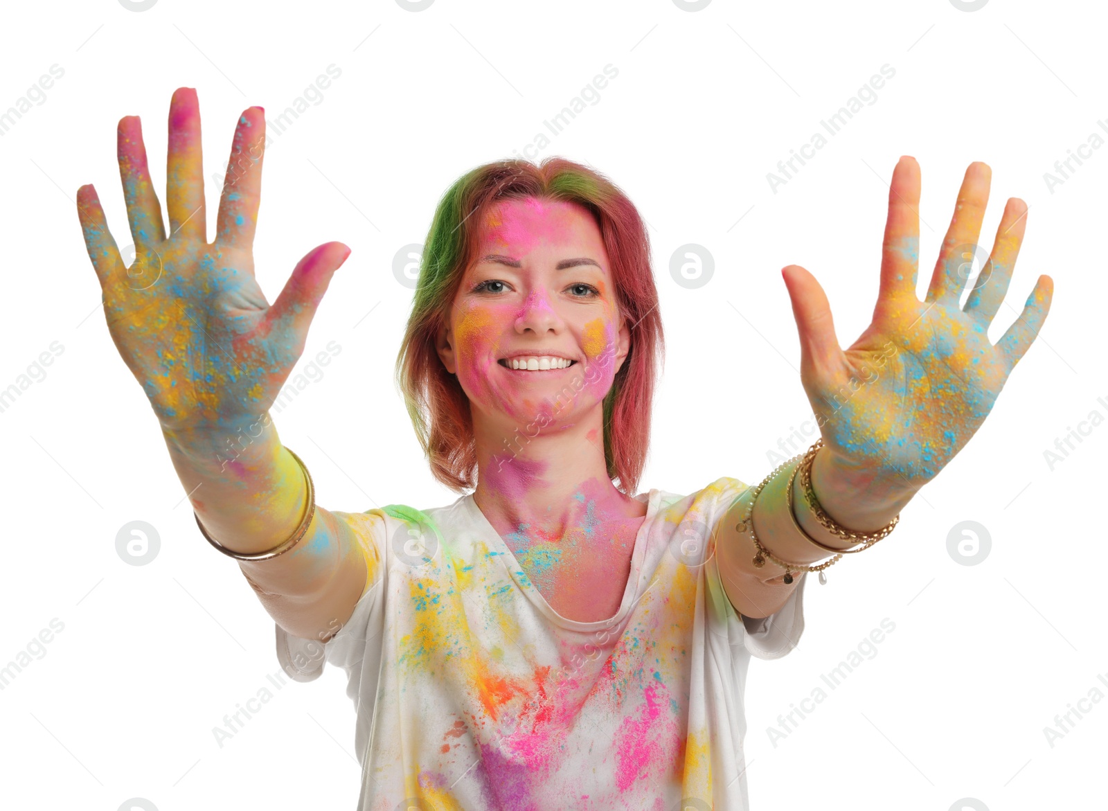 Photo of Woman covered with colorful powder dyes on white background. Holi festival celebration