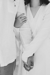 Image of Bride and groom together, closeup. Black and white effect