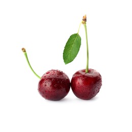 Photo of Ripe sweet cherries with water drops isolated on white