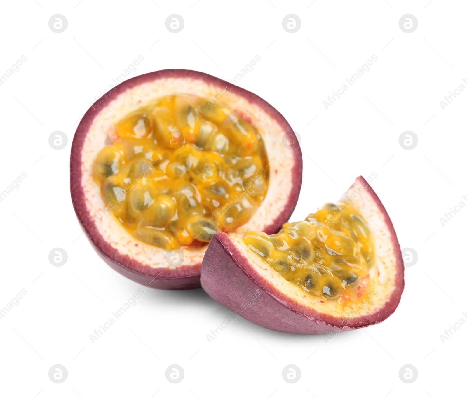 Photo of Slices of fresh ripe passion fruit (maracuya) isolated on white