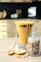 Products on wooden table in modern kitchen