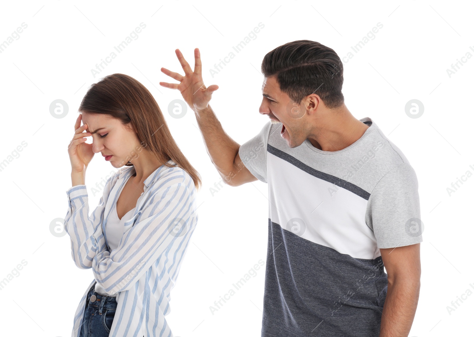 Photo of Man shouting at his girlfriend on white background. Relationship problems