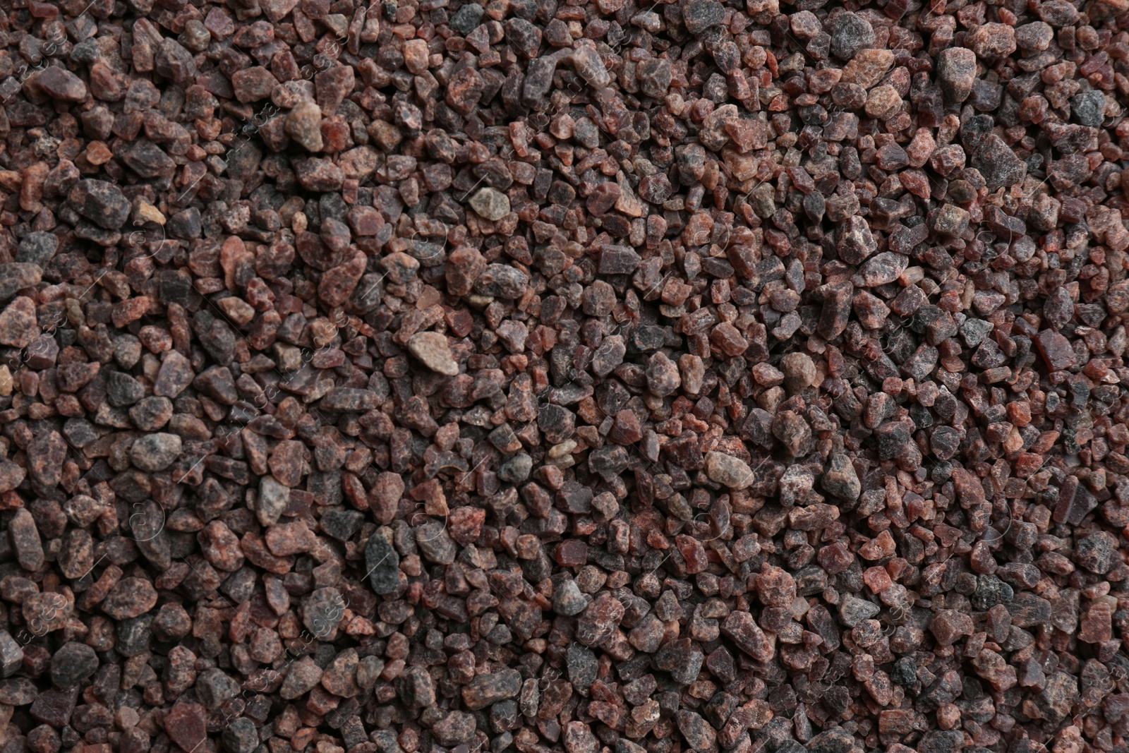 Photo of Pile of black salt as background, top view