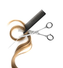 Photo of Strand of light brown hair, comb and thinning scissors on white background, top view. Hairdresser service