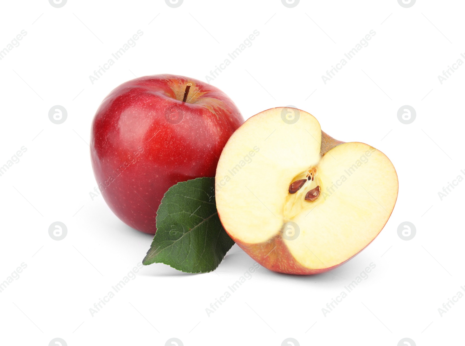 Photo of Ripe juicy red apples with leaf on white background