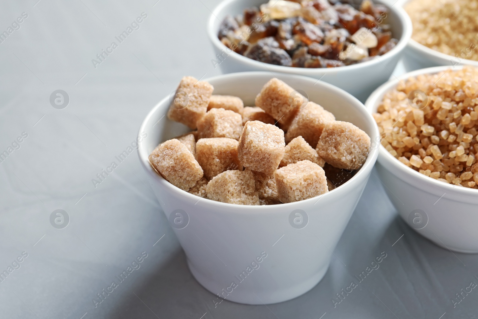 Photo of Bowl with  brown sugar on table